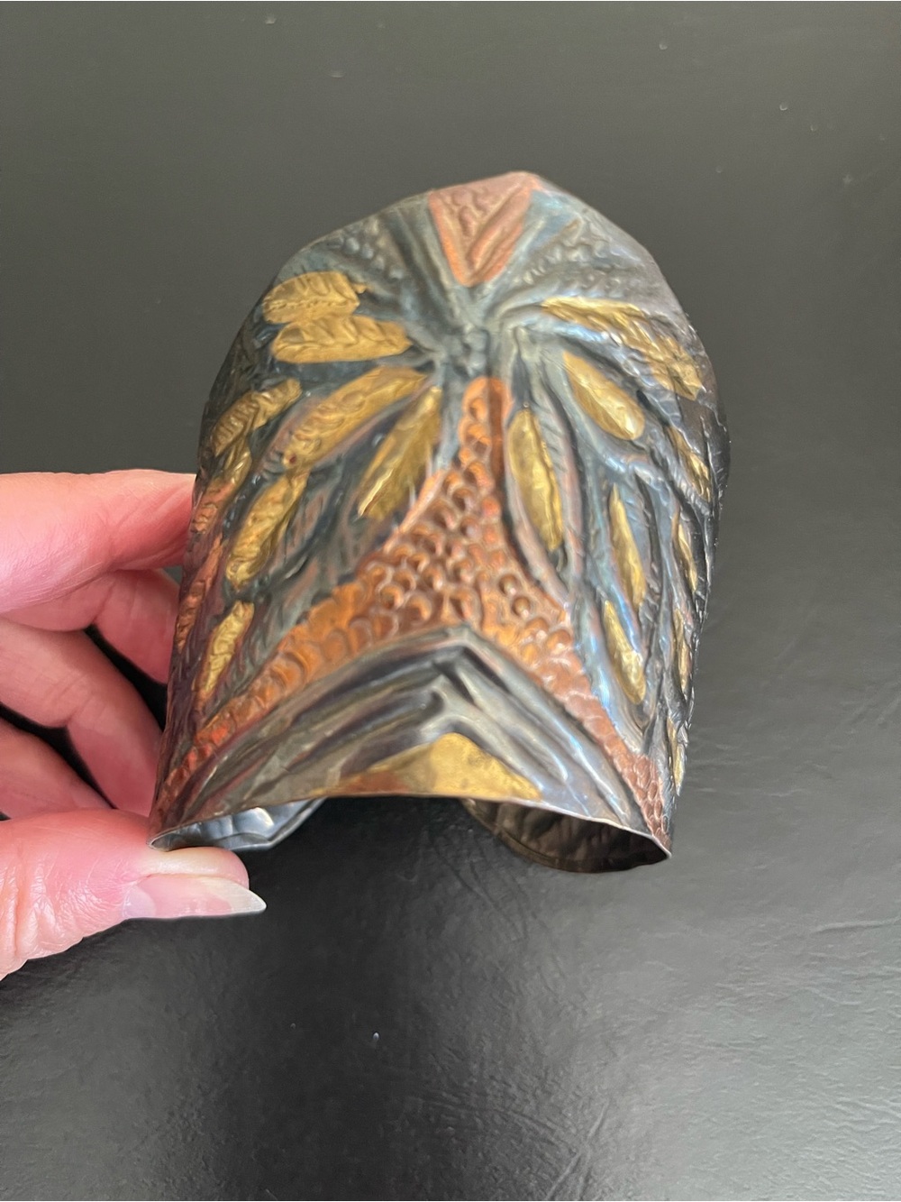 Handmade Embossed Metal Cuff Bracelet in Patina Gold and Copper Tones.